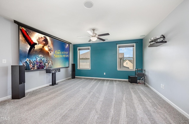 1305 Ivey Grove Ct, Fuquay Varina, NC 27526 - cinema featuring a ceiling fan, carpet floors, and plenty of natural light