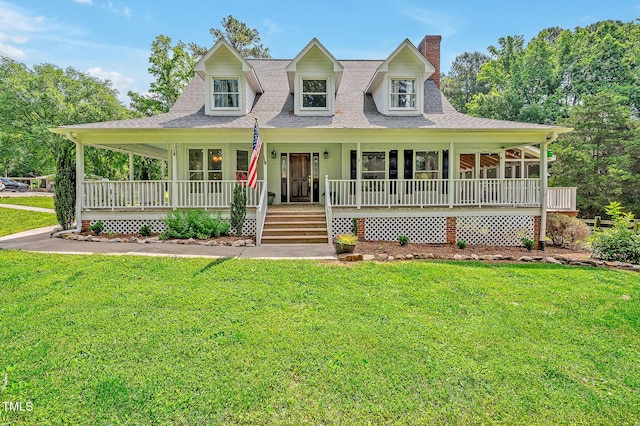 4702 Pleasant Green Rd, Durham, NC 27705 - farmhouse inspired home featuring a porch, a chimney, a front lawn, and a shingled roof