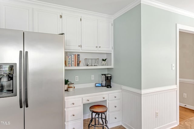 4702 Pleasant Green Rd, Durham, NC 27705 - kitchen with stainless steel fridge, white cabinets, open shelves, light countertops, and crown molding