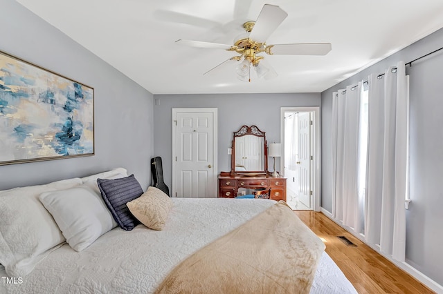 4702 Pleasant Green Rd, Durham, NC 27705 - bedroom with light wood-type flooring and a ceiling fan