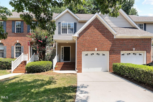 5644 Picnic Rock Ln, Raleigh, NC 27613 - traditional-style house with driveway, brick siding, a shingled roof, a front yard, and an attached garage