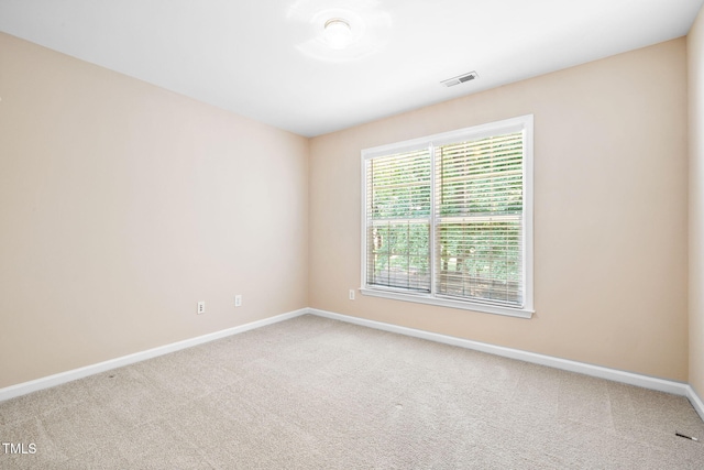 5644 Picnic Rock Ln, Raleigh, NC 27613 - carpeted spare room featuring baseboards
