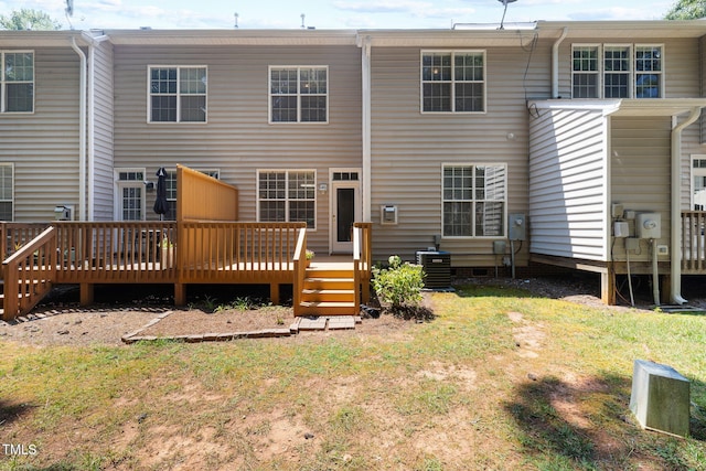5644 Picnic Rock Ln, Raleigh, NC 27613 - rear view of property with a deck and a lawn