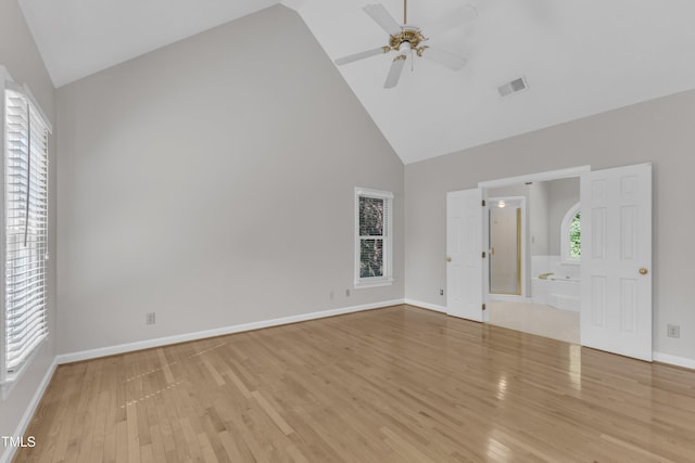 6201 Bayswater Trl, Raleigh, NC 27612 - unfurnished bedroom featuring high vaulted ceiling, wood finished floors, baseboards, ensuite bath, and ceiling fan