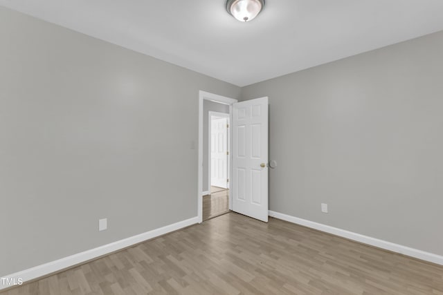 6201 Bayswater Trl, Raleigh, NC 27612 - spare room featuring light wood-type flooring and baseboards
