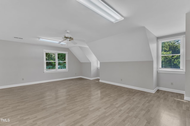 6201 Bayswater Trl, Raleigh, NC 27612 - bonus room with light wood-style floors, baseboards, vaulted ceiling, and a ceiling fan