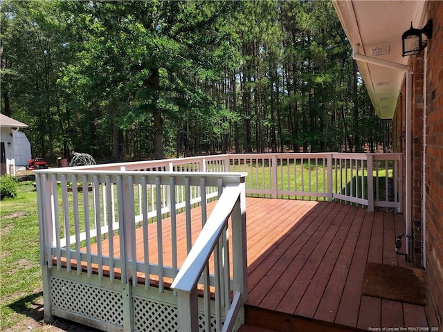 844 Montrose Rd, Raeford, NC 28376 - wooden terrace featuring a yard