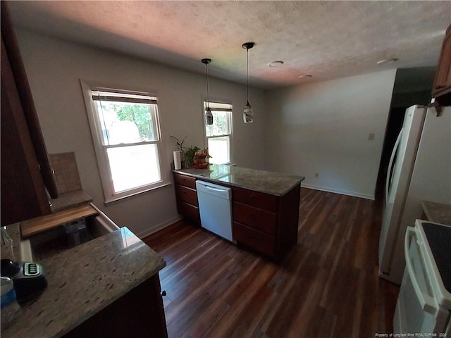 844 Montrose Rd, Raeford, NC 28376 - kitchen with white appliances, a peninsula, dark wood-type flooring, and baseboards