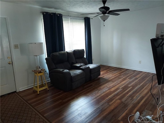 844 Montrose Rd, Raeford, NC 28376 - living area featuring dark wood-style flooring, ceiling fan, and baseboards