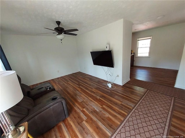 844 Montrose Rd, Raeford, NC 28376 - unfurnished living room with wood finished floors and ceiling fan