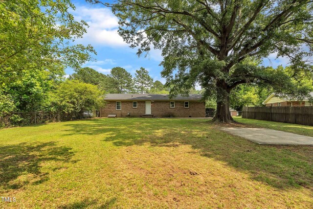 605 Sexton Ave, Zebulon, NC 27597 - view of yard featuring a patio area