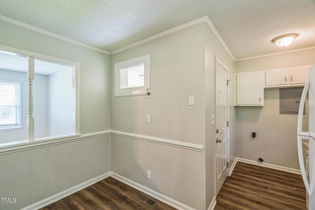 605 Sexton Ave, Zebulon, NC 27597 - washroom featuring hookup for an electric dryer, dark wood-type flooring, a textured ceiling, crown molding, and baseboards