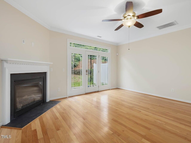 4719 Altha St, Raleigh, NC 27606 - unfurnished living room with hardwood / wood-style floors, baseboards, crown molding, a glass covered fireplace, and ceiling fan