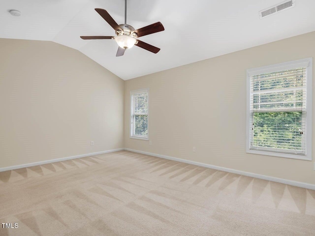 4719 Altha St, Raleigh, NC 27606 - spare room featuring lofted ceiling, ceiling fan, light carpet, baseboards, and a smoke detector
