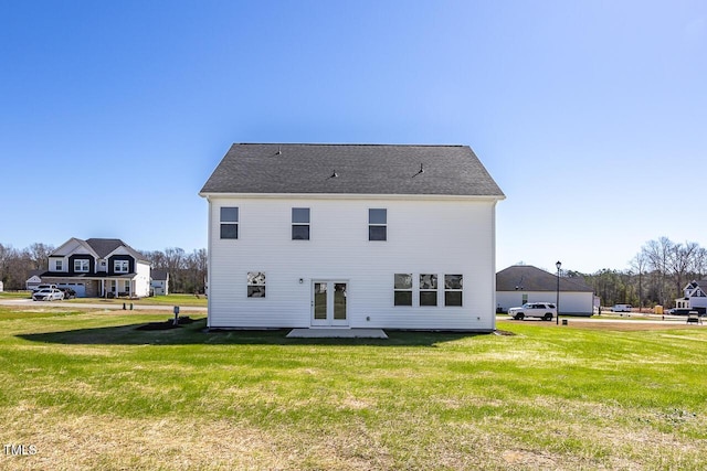 267 Old Fashioned Way, Lillington, NC 27546 - back of house featuring a lawn and french doors