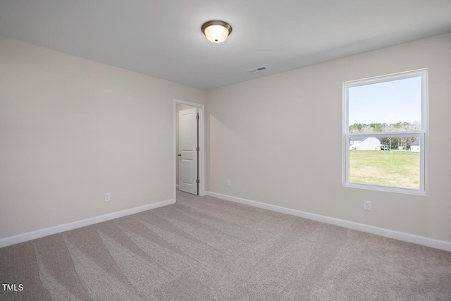 267 Old Fashioned Way, Lillington, NC 27546 - carpeted spare room with baseboards