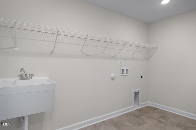 267 Old Fashioned Way, Lillington, NC 27546 - laundry area with washer hookup, baseboards, hookup for an electric dryer, and gas dryer hookup