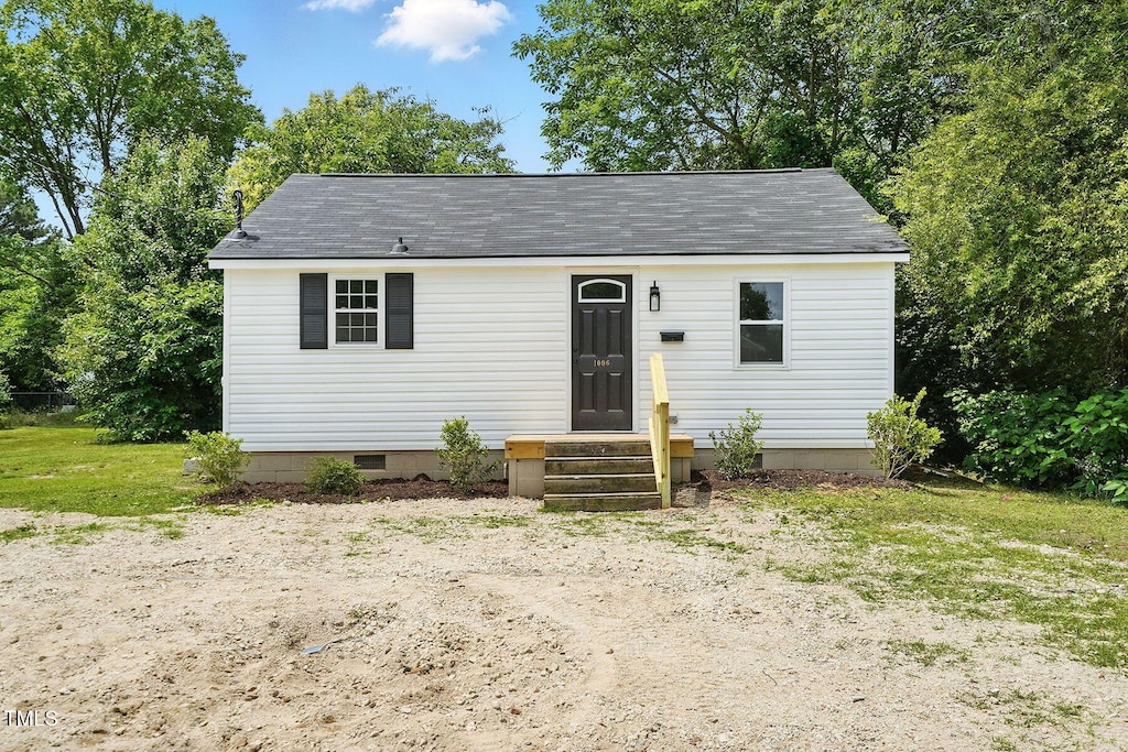 1006 E Harnett St, Dunn, NC 28334 - view of front of house with crawl space and a shingled roof