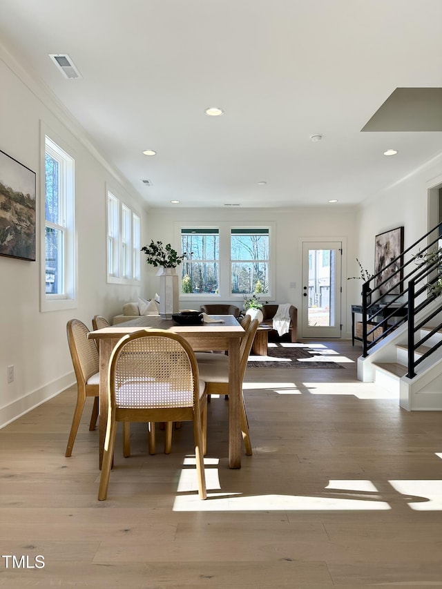 974 Double Helix Rd, Apex, NC 27523 - dining space with plenty of natural light, crown molding, light wood-style floors, baseboards, and recessed lighting