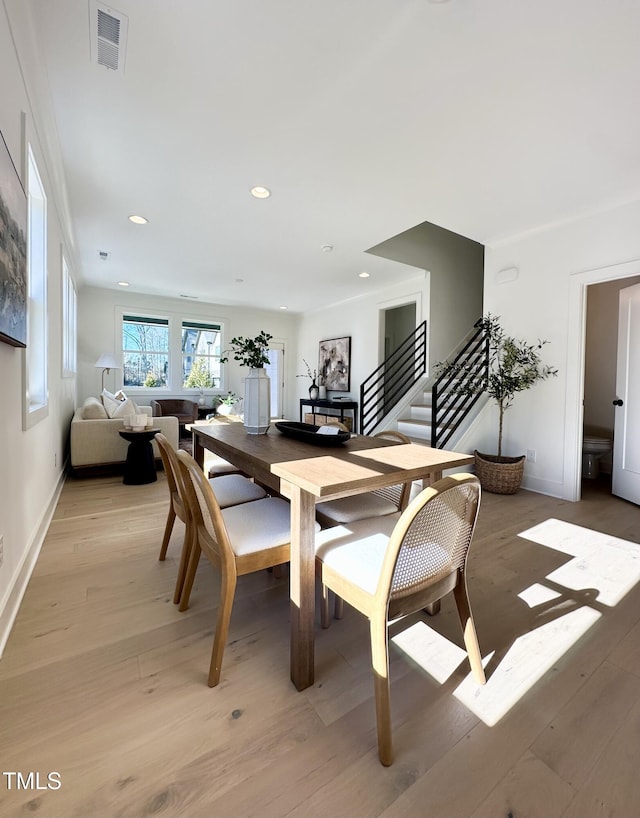 974 Double Helix Rd, Apex, NC 27523 - dining room with light wood finished floors, recessed lighting, baseboards, and stairs