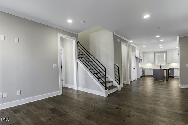 974 Double Helix Rd, Apex, NC 27523 - unfurnished living room featuring recessed lighting, dark wood-style floors, baseboards, stairway, and a sink