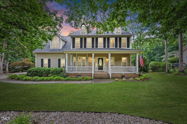 618 Durwood Dr, Raleigh, NC 27603 - colonial-style house with a yard and a porch