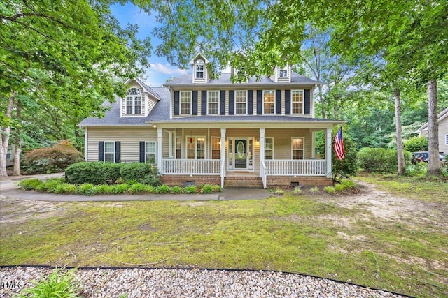 618 Durwood Dr, Raleigh, NC 27603 - colonial-style house featuring a porch, a front lawn, and roof with shingles