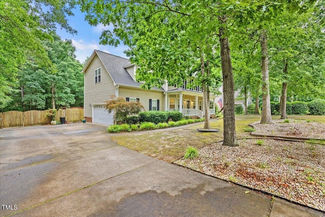 618 Durwood Dr, Raleigh, NC 27603 - view of front of property with concrete driveway, a garage, and a porch