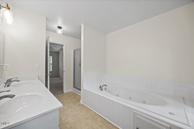 618 Durwood Dr, Raleigh, NC 27603 - full bathroom with a whirlpool tub, double vanity, and a shower stall
