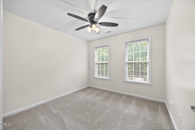 618 Durwood Dr, Raleigh, NC 27603 - empty room with carpet floors, baseboards, and a ceiling fan