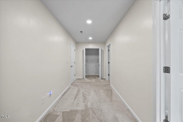 618 Durwood Dr, Raleigh, NC 27603 - hall with light colored carpet, baseboards, and recessed lighting