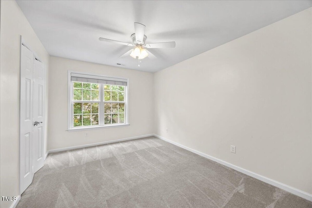 618 Durwood Dr, Raleigh, NC 27603 - unfurnished bedroom with baseboards, carpet, and ceiling fan