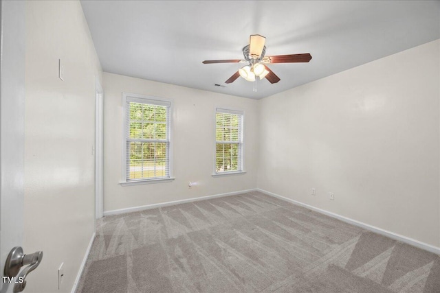 618 Durwood Dr, Raleigh, NC 27603 - spare room featuring baseboards, carpet, and ceiling fan