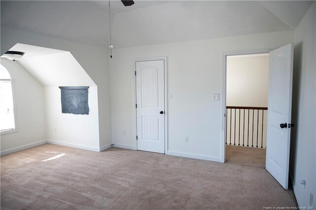 579 Wedgefield Dr, Raeford, NC 28376 - bonus room featuring vaulted ceiling, carpet flooring, baseboards, and a ceiling fan
