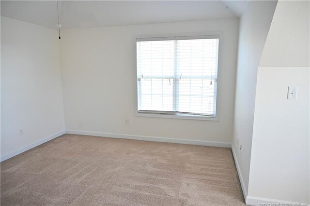 579 Wedgefield Dr, Raeford, NC 28376 - carpeted spare room with baseboards