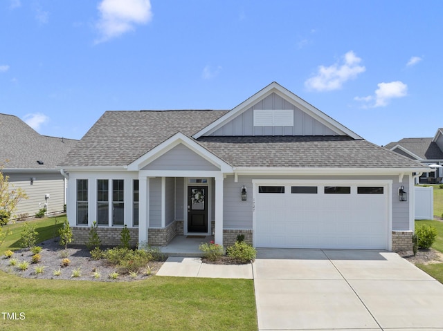1727 Pinecliff Ct, Fuquay Varina, NC 27526 - view of front of house featuring board and batten siding, an attached garage, brick siding, and concrete driveway