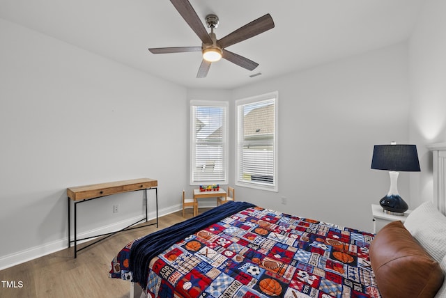 1727 Pinecliff Ct, Fuquay Varina, NC 27526 - bedroom with wood finished floors and a ceiling fan