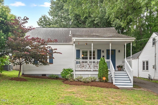 1826 Northgate St, Durham, NC 27704 - view of front facade featuring covered porch, a front lawn, roof with shingles, and central AC unit