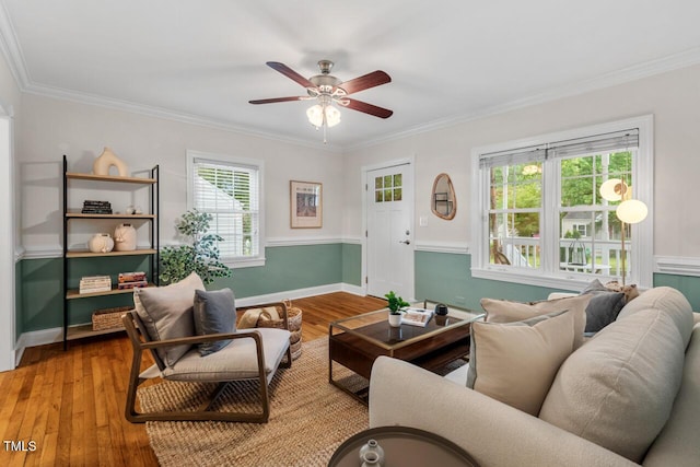 1826 Northgate St, Durham, NC 27704 - living room with crown molding, wood-type flooring, a ceiling fan, and baseboards