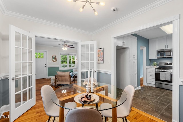 1826 Northgate St, Durham, NC 27704 - dining room featuring french doors, ornamental molding, wood finished floors, baseboards, and ceiling fan