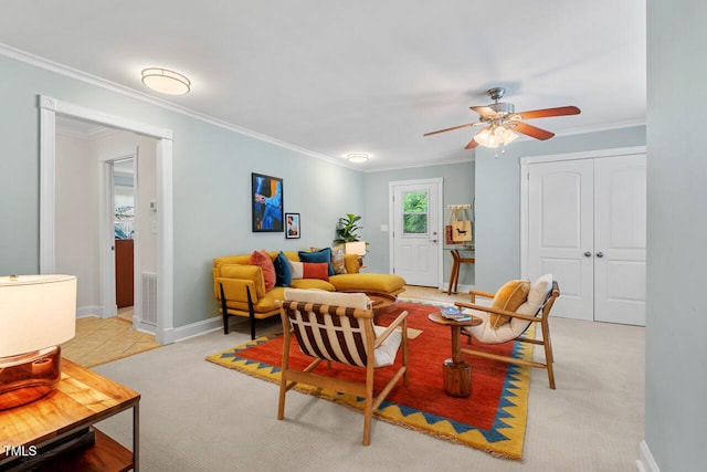1826 Northgate St, Durham, NC 27704 - living room with a ceiling fan, crown molding, baseboards, and light carpet