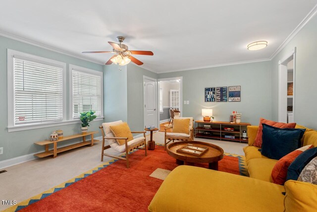 1826 Northgate St, Durham, NC 27704 - carpeted living area with ornamental molding, a ceiling fan, and baseboards