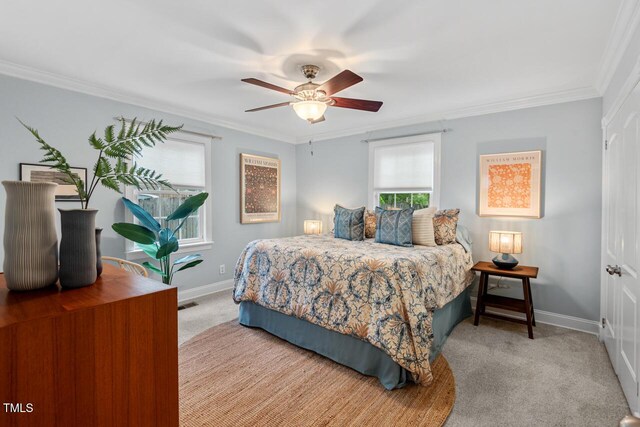 1826 Northgate St, Durham, NC 27704 - carpeted bedroom with ornamental molding, baseboards, and a ceiling fan