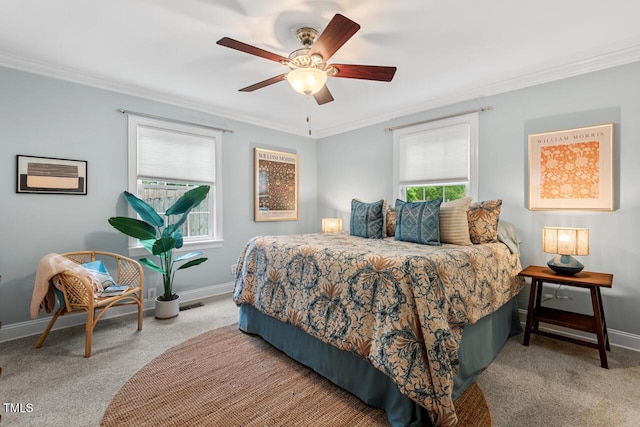 1826 Northgate St, Durham, NC 27704 - carpeted bedroom featuring baseboards, ornamental molding, and a ceiling fan