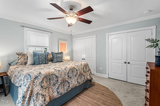 1826 Northgate St, Durham, NC 27704 - bedroom with two closets, carpet, ornamental molding, baseboards, and ceiling fan