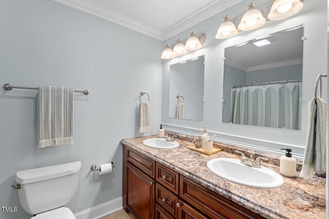 1826 Northgate St, Durham, NC 27704 - bathroom featuring double vanity, toilet, ornamental molding, baseboards, and a shower with shower curtain