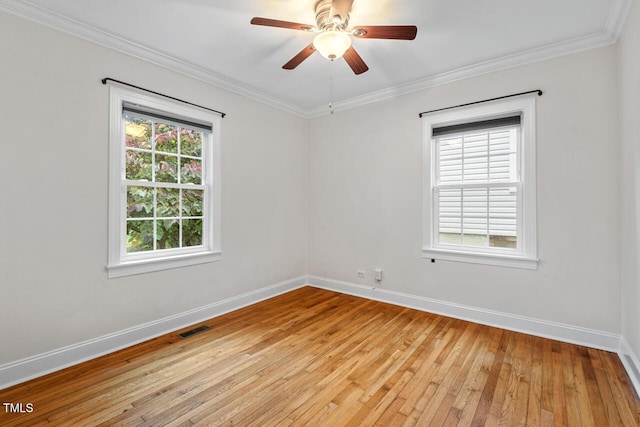 1826 Northgate St, Durham, NC 27704 - spare room with light wood-type flooring, baseboards, ornamental molding, and ceiling fan