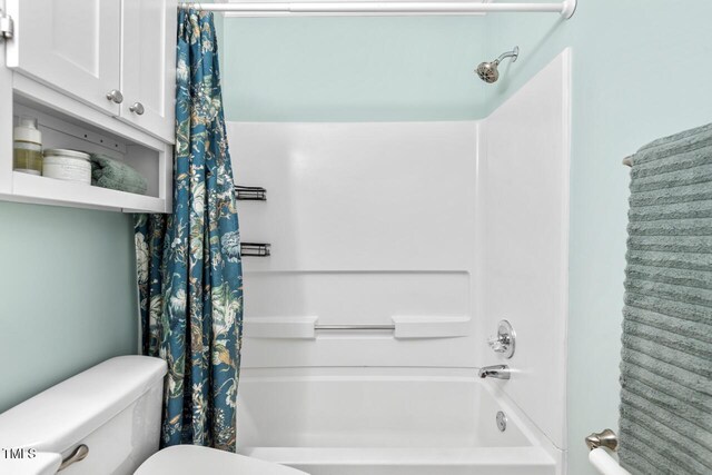 1826 Northgate St, Durham, NC 27704 - bathroom with shower / bath combination with curtain and toilet