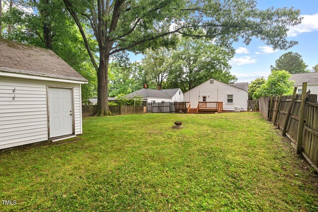 1826 Northgate St, Durham, NC 27704 - view of yard featuring a deck and an outdoor structure
