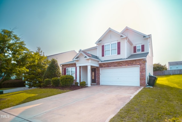 8021 Wesley Farm Dr, Raleigh, NC 27616 - view of front of property featuring an attached garage, concrete driveway, and stone siding